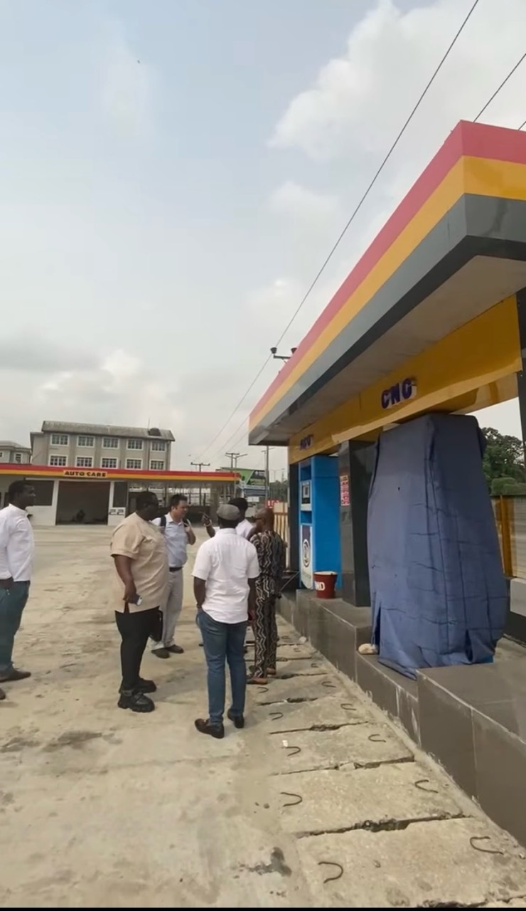 Project team reviewing CNG forecourt integration